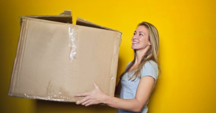 girl with moving boxes