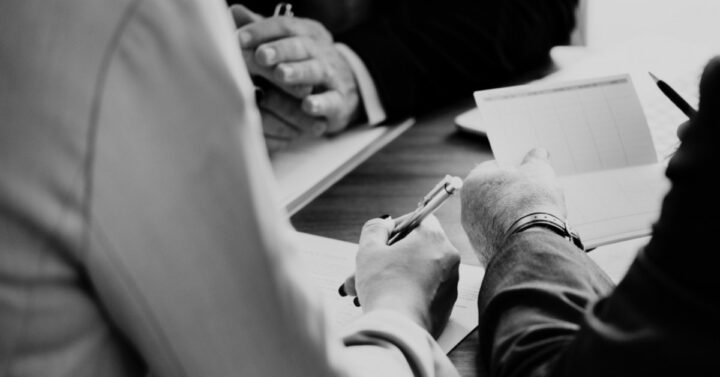 employees at a confernece table