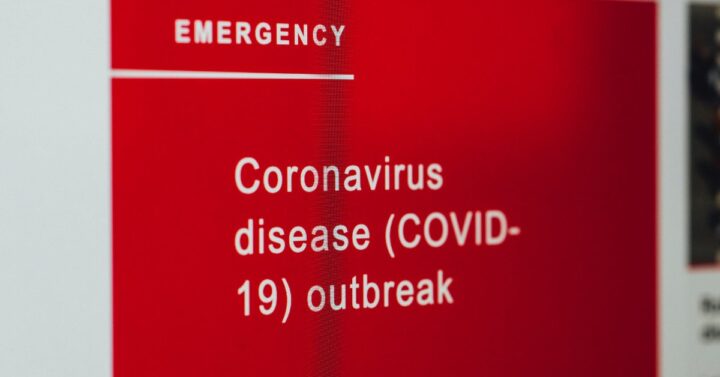 red sign about coronavirus disease outbreak