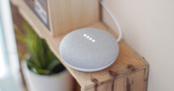 Google Nest smart home device placed on a wooden table