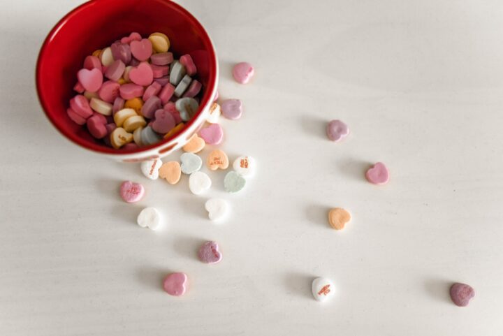 Sweetheart candy's in a bowl.