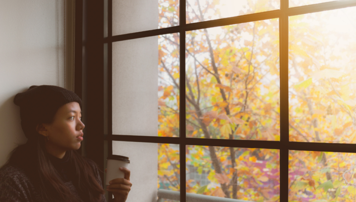 woman dealing with homesickness after moving