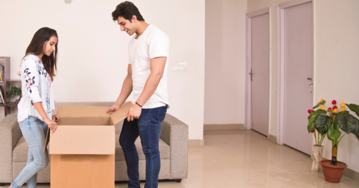 photo of couple moving into a new house