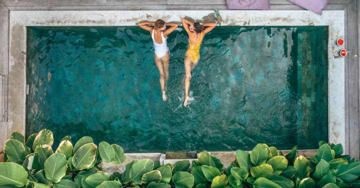 People Relaxing in a Pool