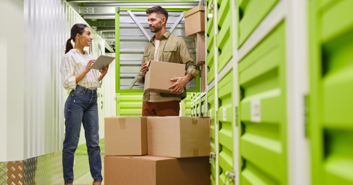 a couple packing a storage unit