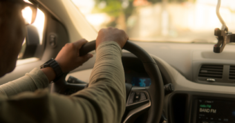 image of person driving car