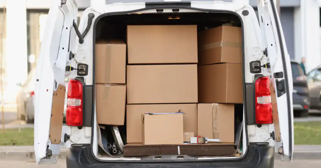 photo of a van filled with boxes