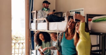 A group of friends in a college dorm.