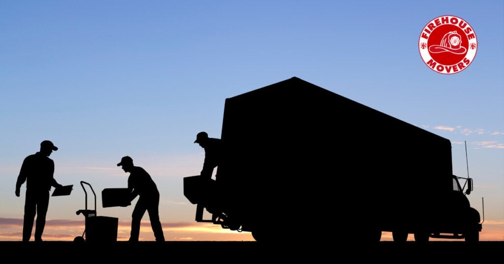 a team of movers loading a truck