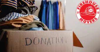 a box of clothes in a donation box