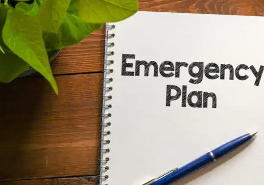Emergency Plan written on a notebook