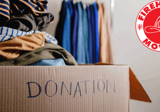 a box of clothes in a donation box