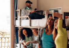 A group of friends in a college dorm.
