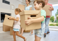 a couple packing a storage unit
